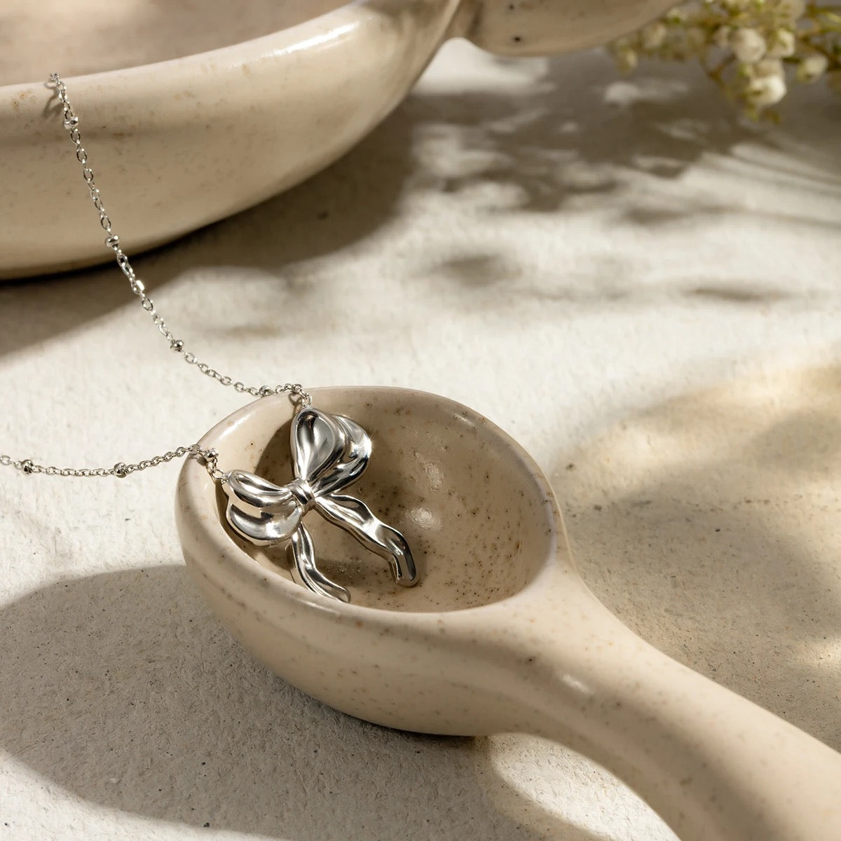 Bow Tie silver necklace